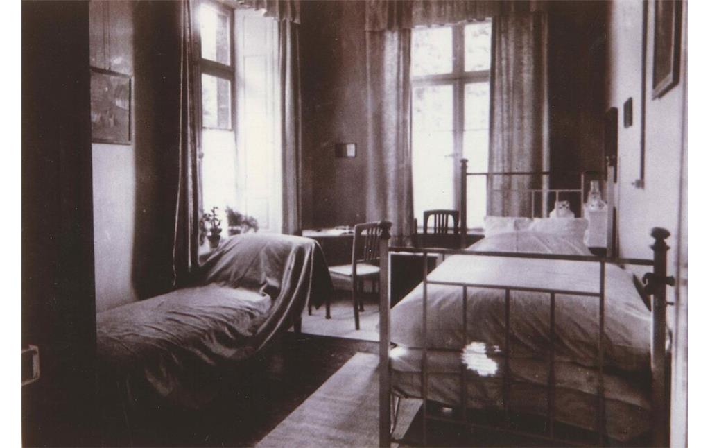 Historische Fotografie eines Innenraumes im Krupp'schen Beamten-Erholungshaus in Bendorf-Sayn (1914)
