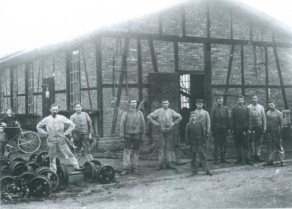 Historische Aufnahme von Arbeitern (Beginn 20. Jahrhundert)