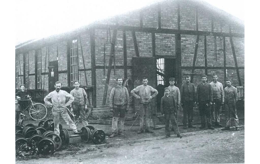 Historische Aufnahme von Arbeitern (Beginn 20. Jahrhundert)