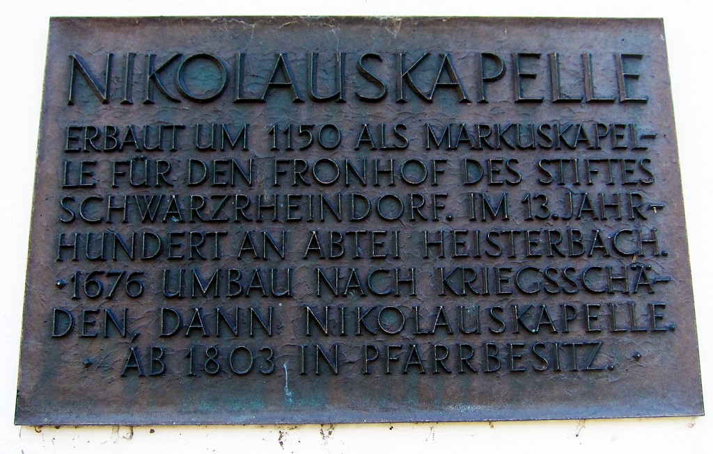 Informationstafel an der Nordseite der Nikolauskapelle (ehemalige Markuskapelle) in Königswinter-Heisterbacherrott (2014)