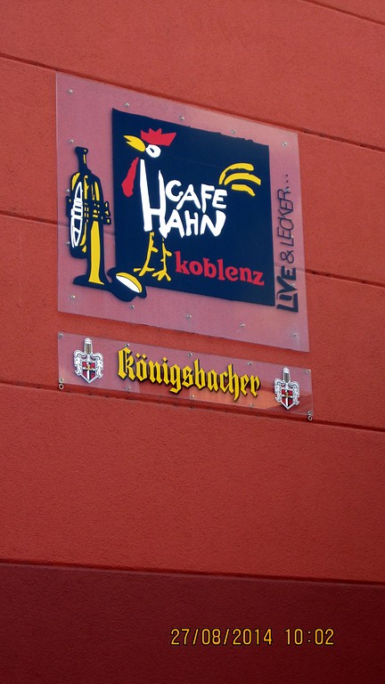 Das Logo des Café Hahn in Koblenz-Güls an einer Gebäudewand (2014).