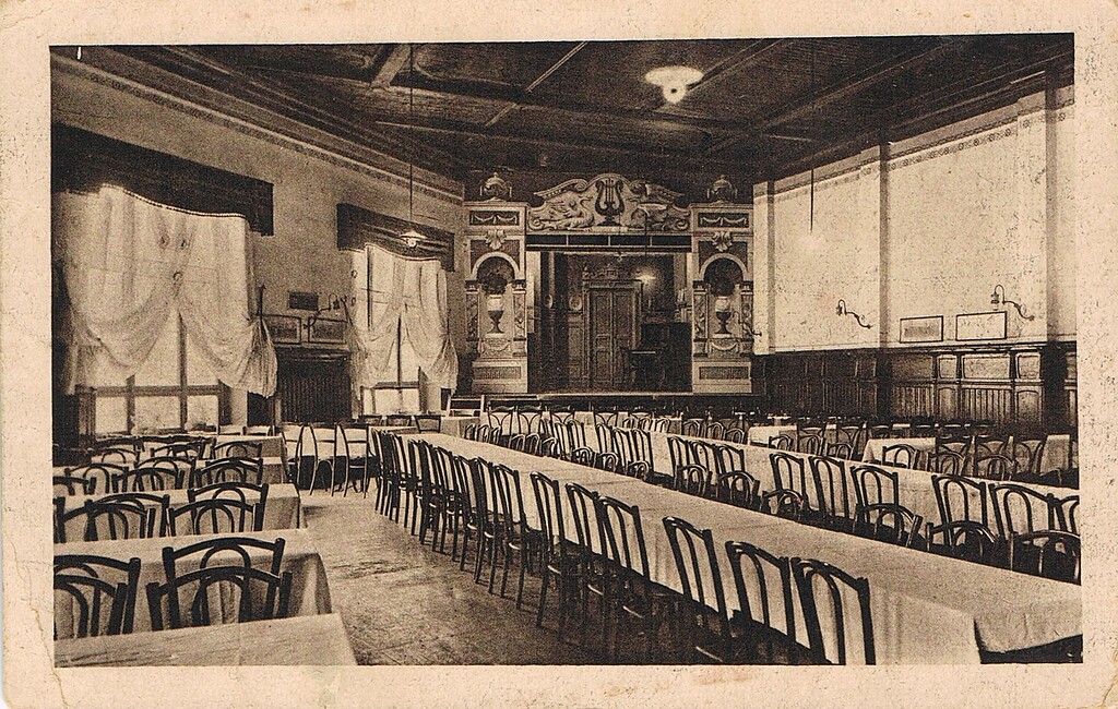 Historische Postkarte (um 1925): Innenansicht des Café Bade in Köln-Riehl, einem Vorgängerbau der Tankstelle "Zoogarage".