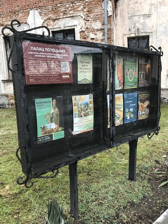 Tourist information board in front of Krystynopil Palace (2021)