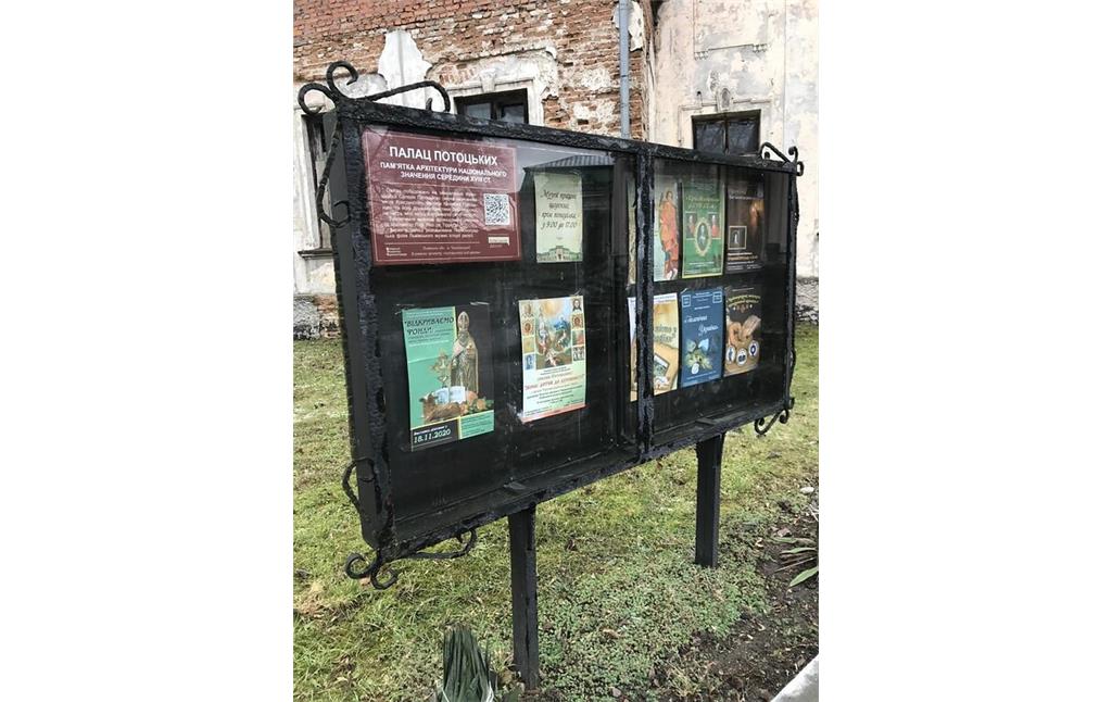 Tourist information board in front of Krystynopil Palace (2021)
