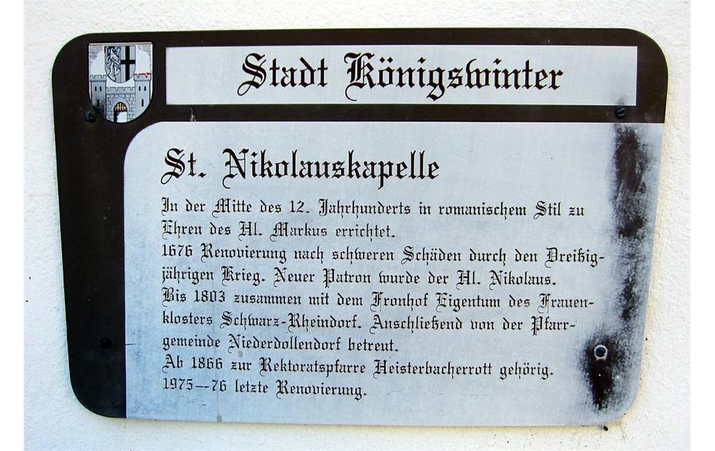 Informationstafel an der Ostseite der Nikolauskapelle (ehemalige Markuskapelle) in Königswinter-Heisterbacherrott (2014)