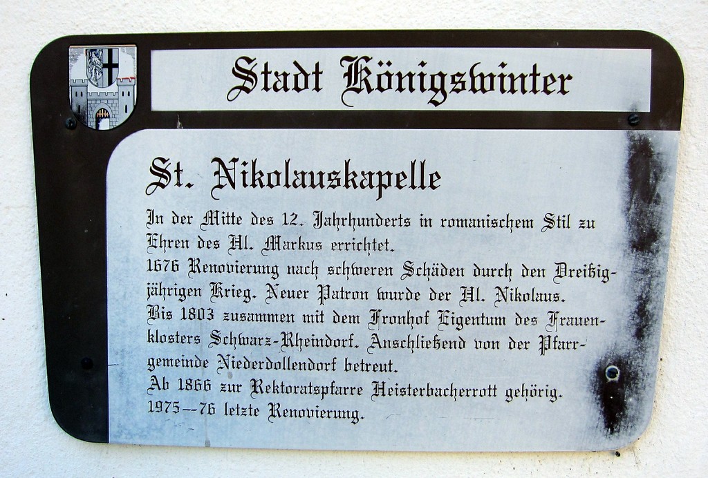 Informationstafel an der Ostseite der Nikolauskapelle (ehemalige Markuskapelle) in Königswinter-Heisterbacherrott (2014)