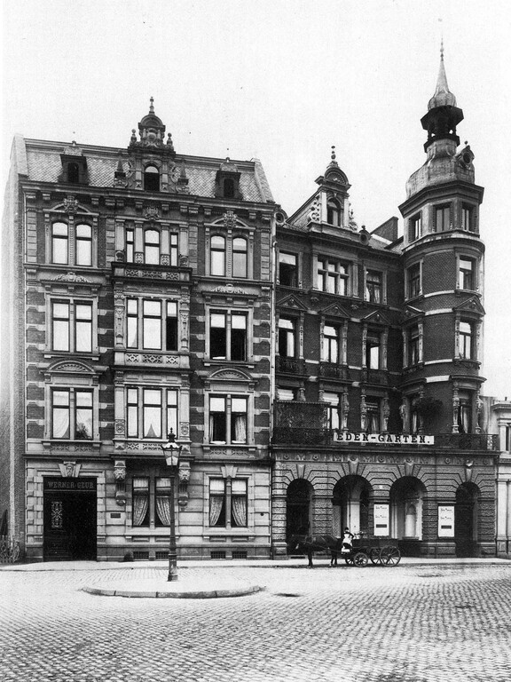 Historische Aufnahme der Gebäude Friesenplatz 21 und 23 in Köln (um 1886). Haus Nr. 23 (rechts im Bild) war Sitz des Vergnügungslokals und Varieté-Theaters "Eden-Garten" der Unternehmerfamilie Lefrère und über diese um 1924/25 Standort der Kölner "Amor-Automobilbau G.m.b.H.".