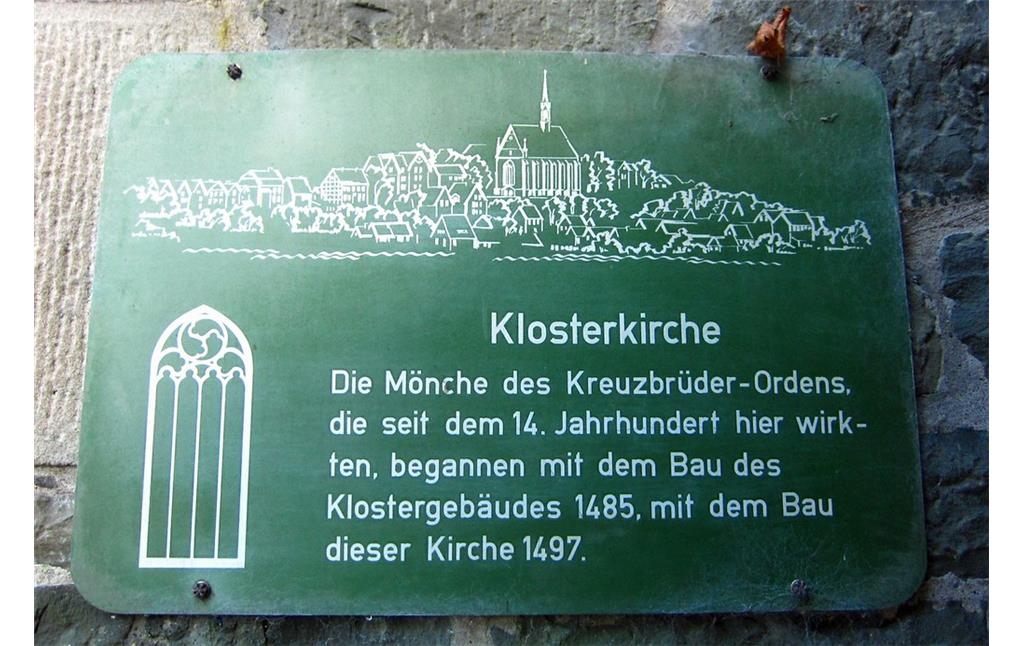 Informationstafel am Eingang zur Klosterkirche des ehemaligen Kreuzherrenklosters Sankt Maria Magdalena in Wuppertal-Beyenburg (2014).