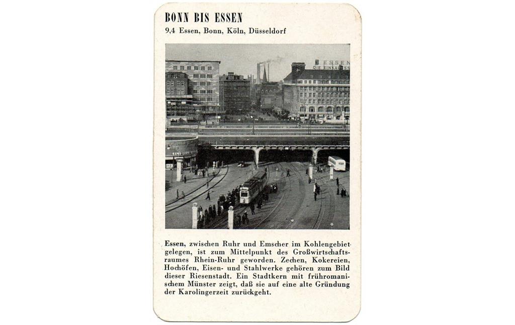 Spielkarte "Essen" mit einer Ansicht der Innenstadt, in der Bildmitte hinten ist der Kirchturm des Essener Münsters zu sehen, im Vordergrund die Bahnanlagen am Hauptbahnhof (aus dem Quartettspiel "Der Rhein", Ravensburger Spiele Nr. 305, Otto Maier Verlag 1952).